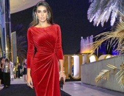  لبنان اليوم - الفستان الأحمر الساحر لمظهر أنيق لا يقاوم في الكريسماس