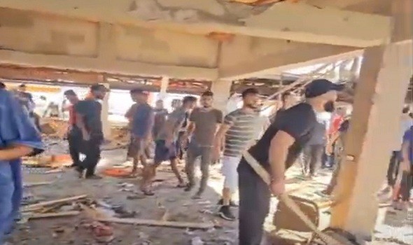  لبنان اليوم - المقهى الذي حوّلته الغارات الإسرائيلية اليوم إلى مقبرة على شاطىء بحر غزّة دفن فيها ٣٧ شهيدا